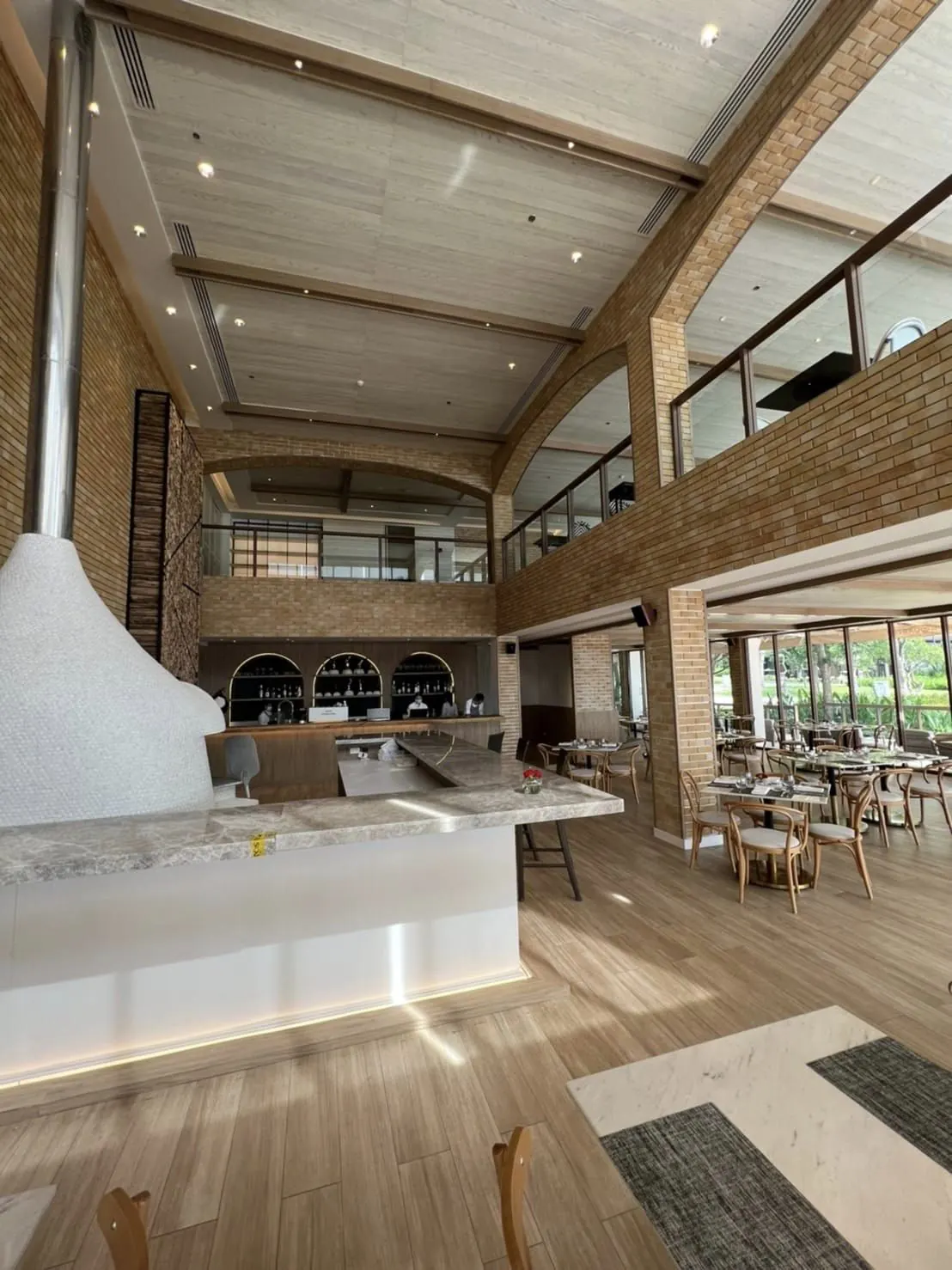 Prego: the wood-fired oven rising beside the mezzanine